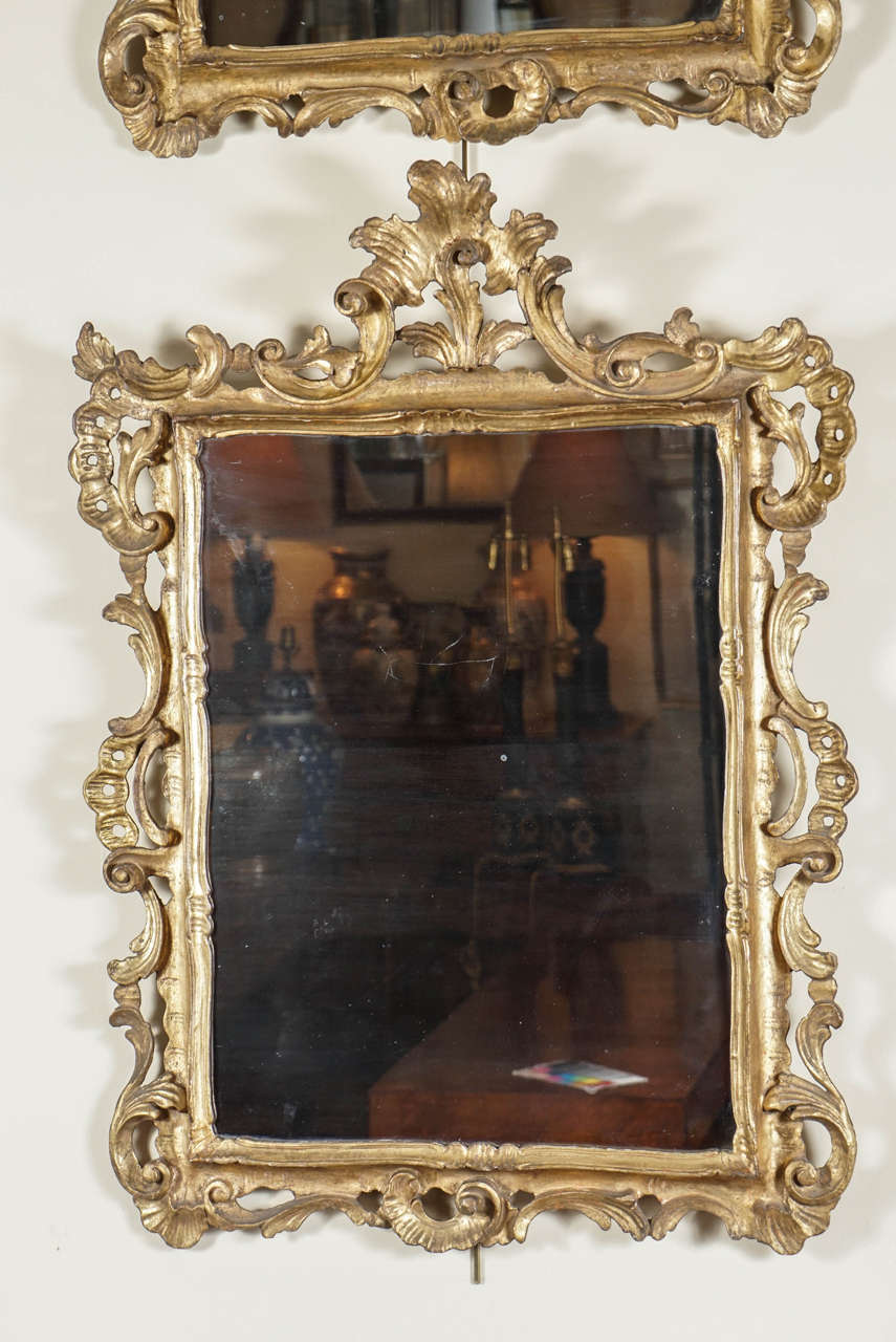 Pair of carved Baroque style mirrors. Italian with original glass and gilt.