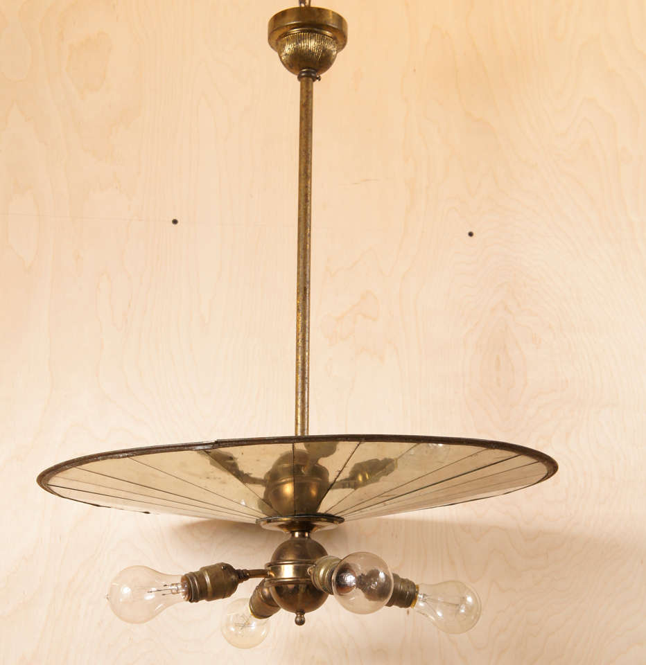 Four light mirror chandelier. American late nineteenth century. All original hardware.