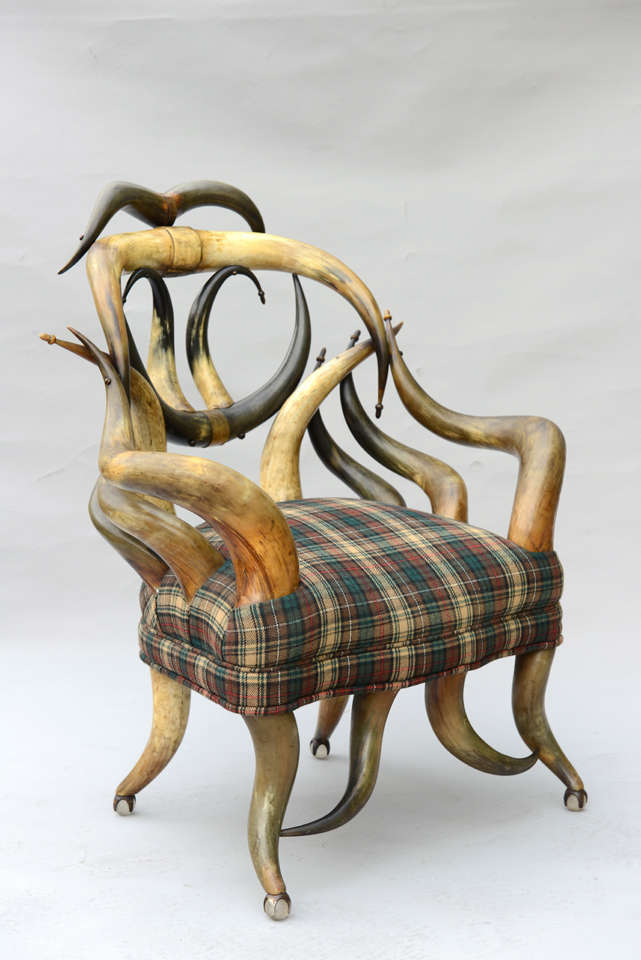 Rare arm chair, of Texan steer horns, with carved acorn tips, on Tiffany glass ball feet, by Wenzel Friedrich (Bohemia/San Antonio, Texas 1827-1902).