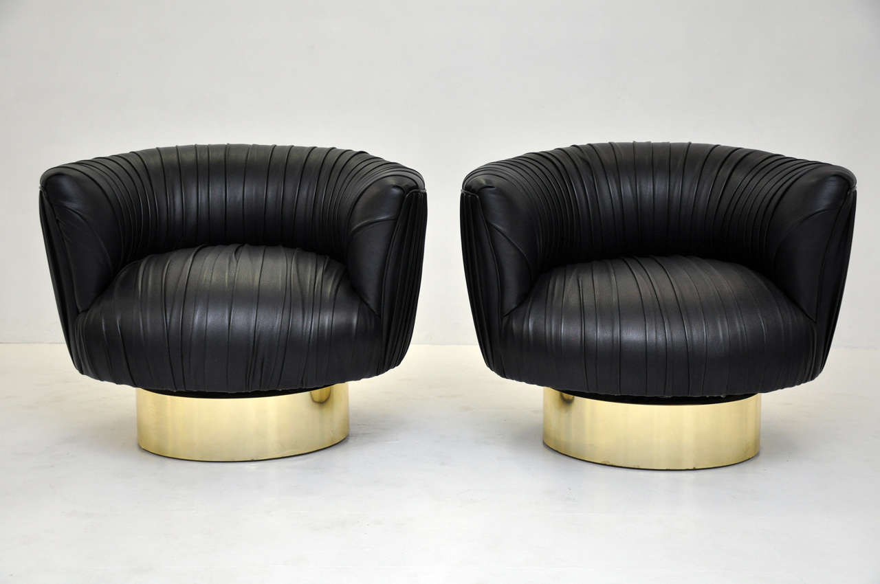 Brass Milo Baughman swivel chairs