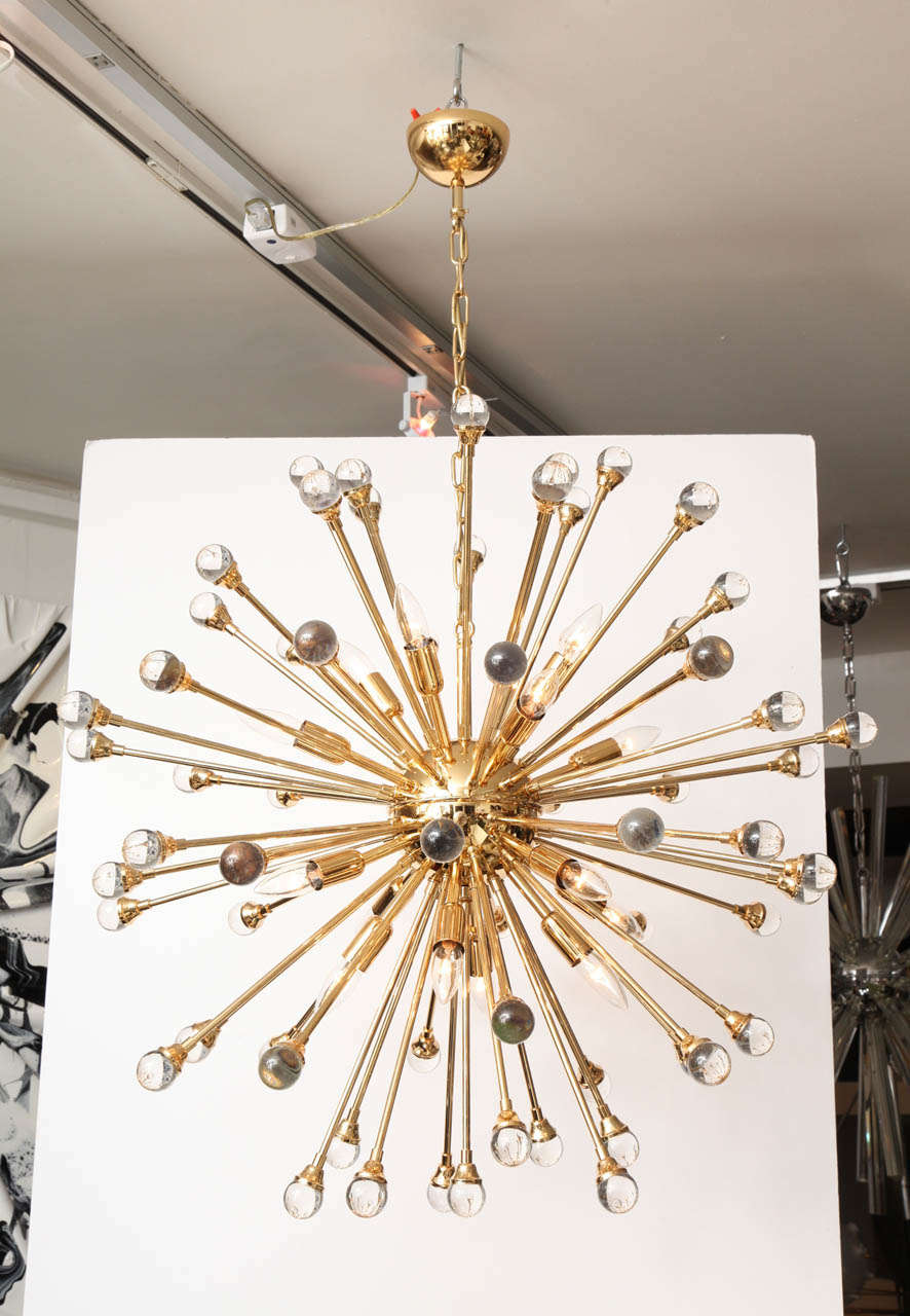 Decorative large gold plated sputnik. Italy. It takes 16 light bulbs, 35