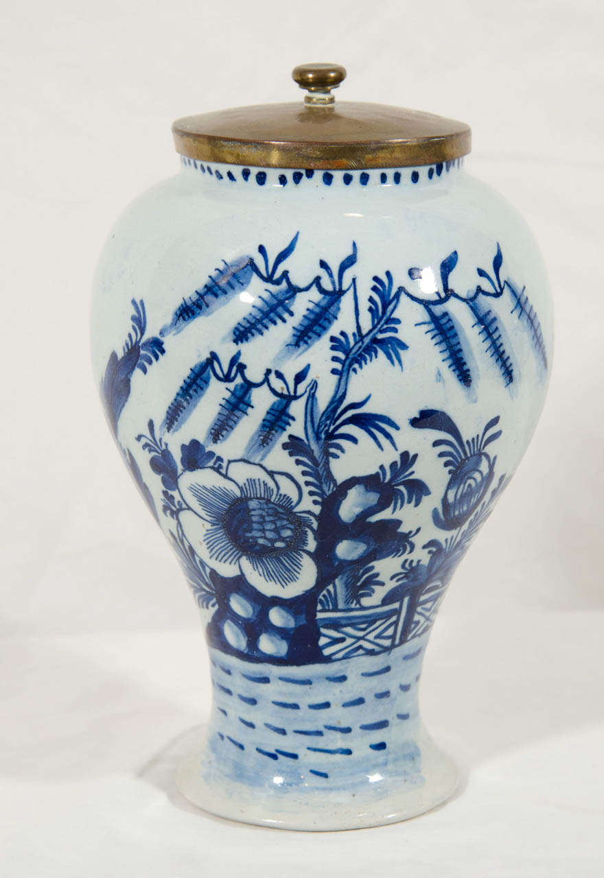 A Pair of Small Dutch Delft Blue and White Covered Jars