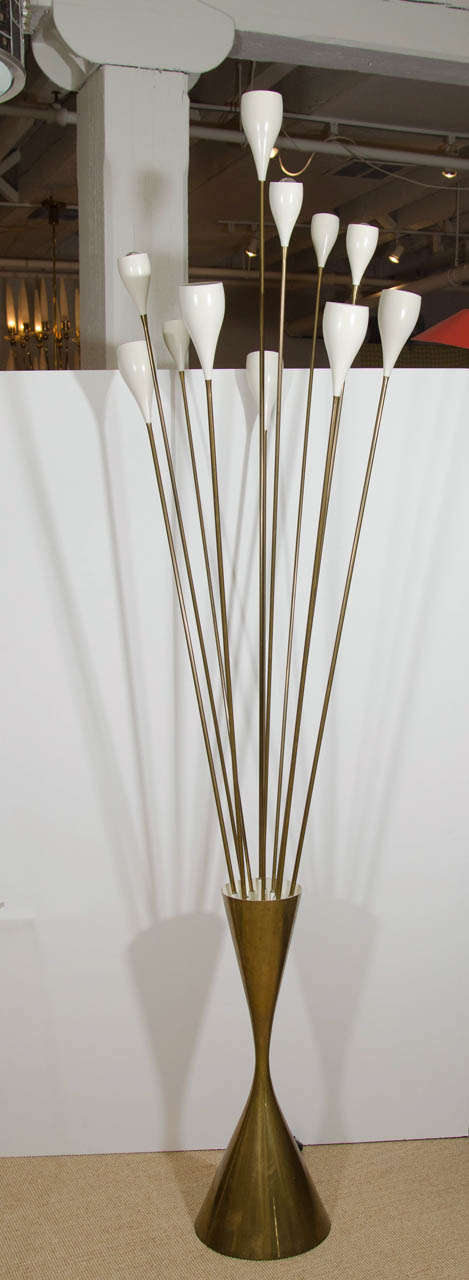Angelo Lelli floor lamp with multiple lights with white shades and a bronze base.
