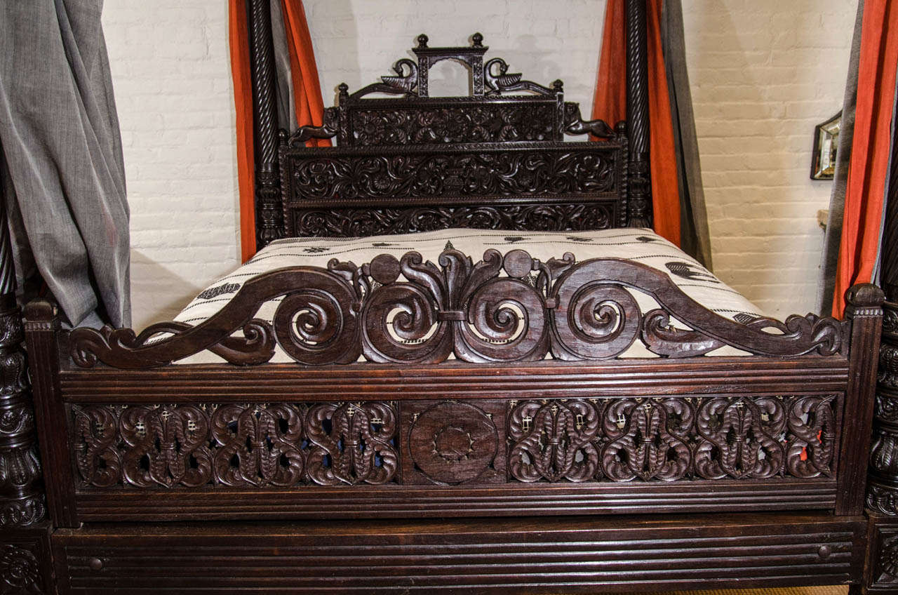 A Finely Carved 19th Century Anglo-Indian Mahogany Bed with Metal Canopy In Excellent Condition In Long Island City, NY