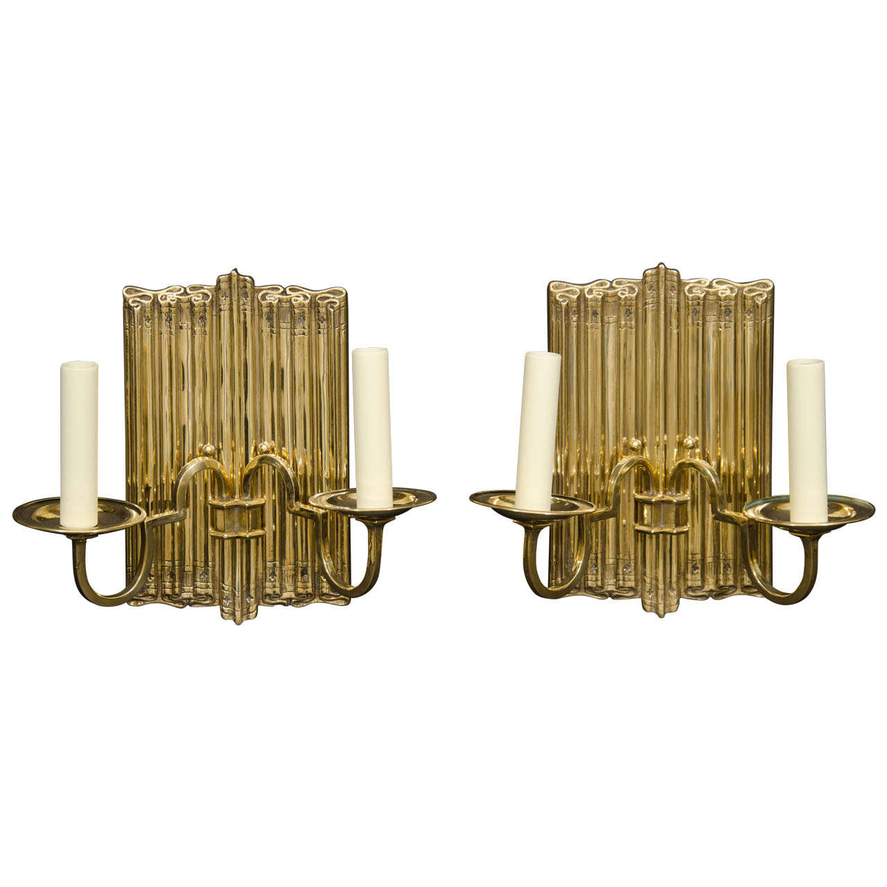 Polished Brass Two Light Linen Fold Backed Sconces For Sale