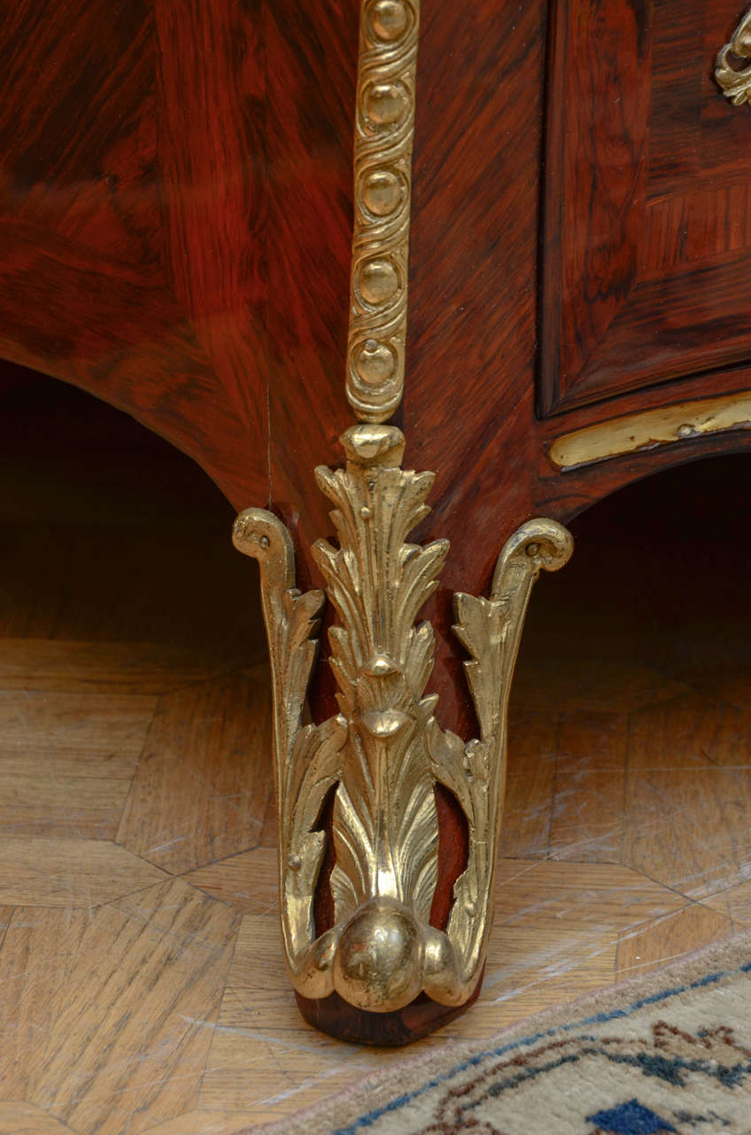 A Regence Ormulu-Mounted and Brass Inlaid Kingwood Commode 1