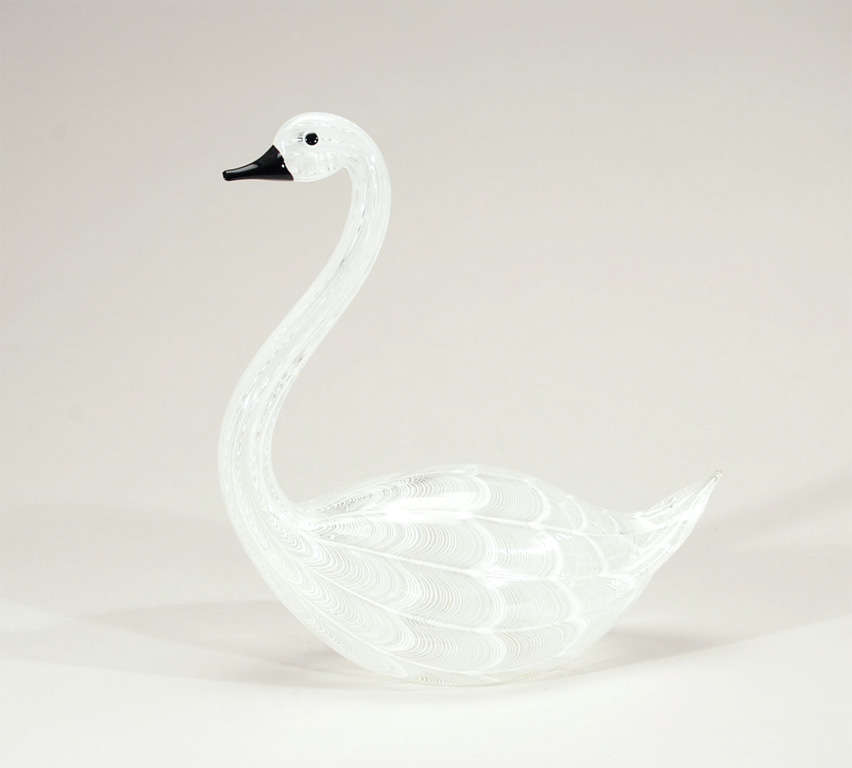 This fabulous, well-executed hand blown swan is a perfect decorative element or a whimsical centerpiece. The realistic face looks out all around him. Hand blown and signed by Licio Zanetti, the famed Murano artist, the glass looks like realistic