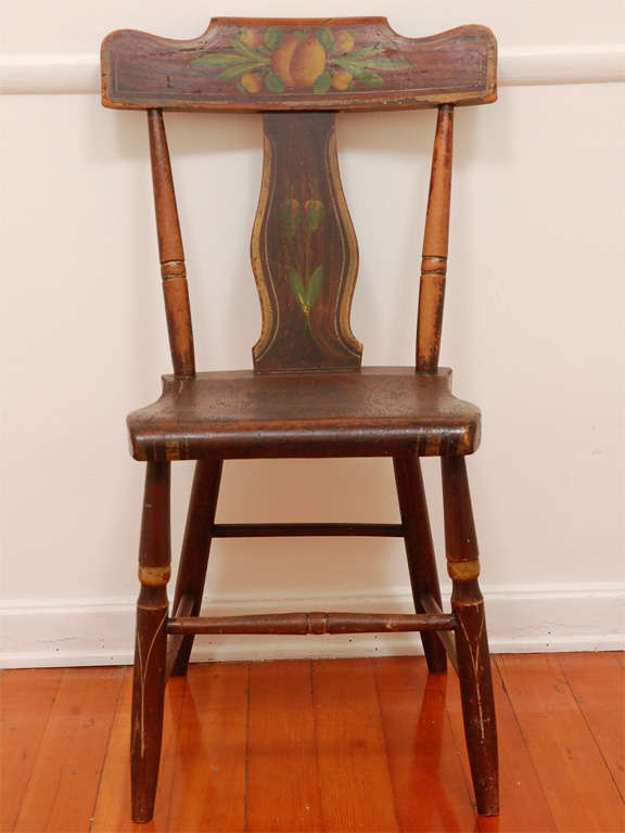 Fantastic 19th century original paint decorated with fruit on back splash and floral back splash from Berks County, Pennsylvania. This set of four matching comfortable kitchen chairs are in wonderful condition with the great worn patina. They are