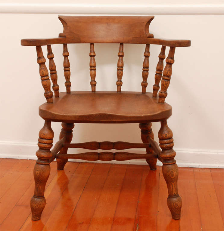 This wonderful set of four oak English Pub captains chairs are in great condition and very heavy also sturdy.They have a wonderful mellow patina .