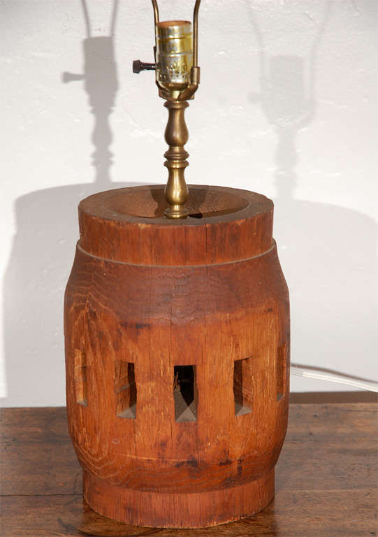 This wonderful old patina barrel has been converted to a wonderful rustic wired lamp.The shade is made from a thick foe hide shade,very strong and in good shape.This lamp is in good working order.