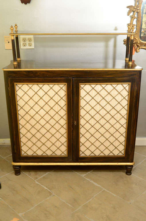An Unusual Pair of Regency Grill Door Chiffoniers