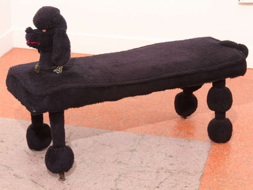 I believe this was originally used in retail store display.  This falls somewhere between charming and terrifying...just where I love it!  This delicate seat was an iconic symbol of a world-wide fascination will all things poodle in the 1960s.