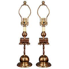 Arts and Crafts brass candlestick lamps.