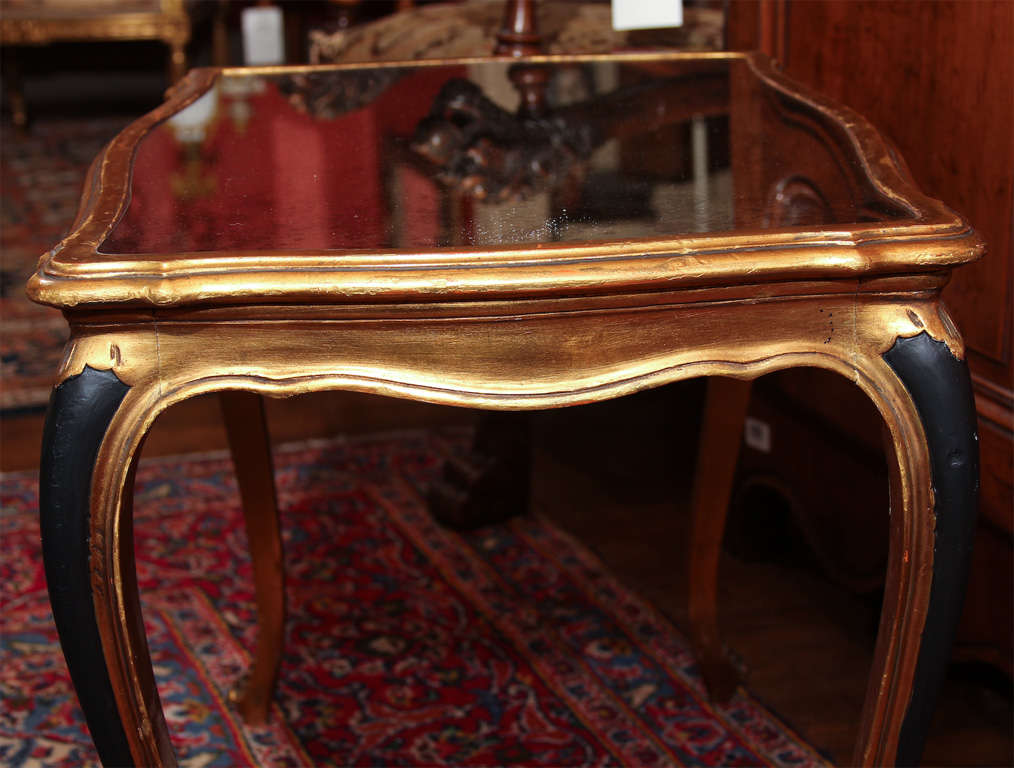 Black and gold painted coffee table with mirrored top For Sale 3