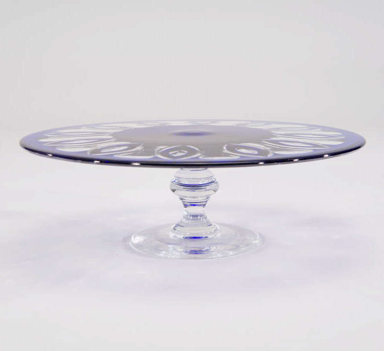 This Art Deco Style crystal footed cake stand is a real show stopper. Hand blown crystal cased in cobalt and cut to clear creates a dramatic contrast for serving. Made as a cake stand it could creatively be used as a centerpiece or serving canapes