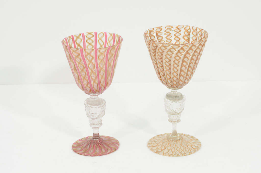 Two Salviati vetro a retorti renaissance-style goblets with mold-blown stems featuring two lion heads and garlands. (May be sold separately.)