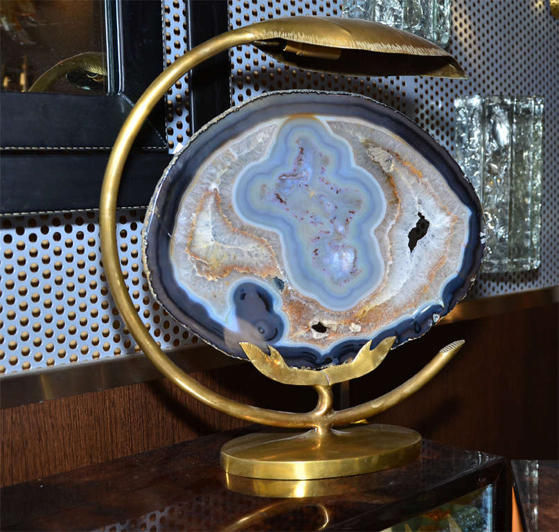 Agate on a sculptured brass base signed Henri Fernandez and dated 1978.