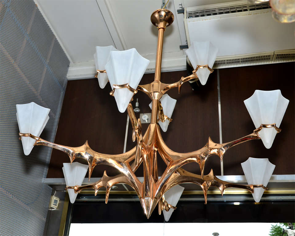 Fantastic abstract chandelier in solid polished bronze.
Nine lights.
Signed Van Heeck.
1970's 
Belgium