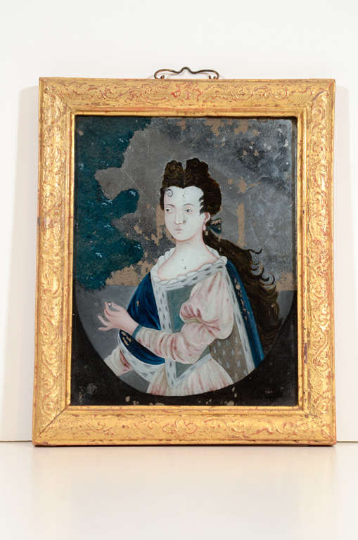 A fine late 18th century Chinese reverse glass 
painting of a lady 
in a giltwood frame
mounted on a contemporary stand
