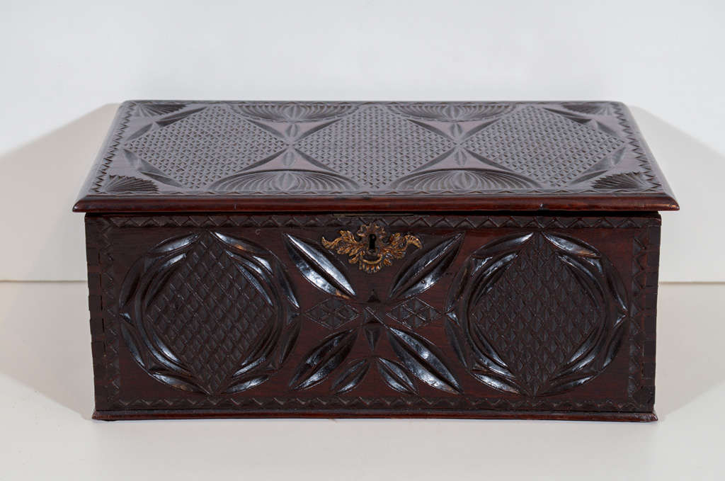 An early 19th century English chip carved mahogany box
first quarter 19th century
