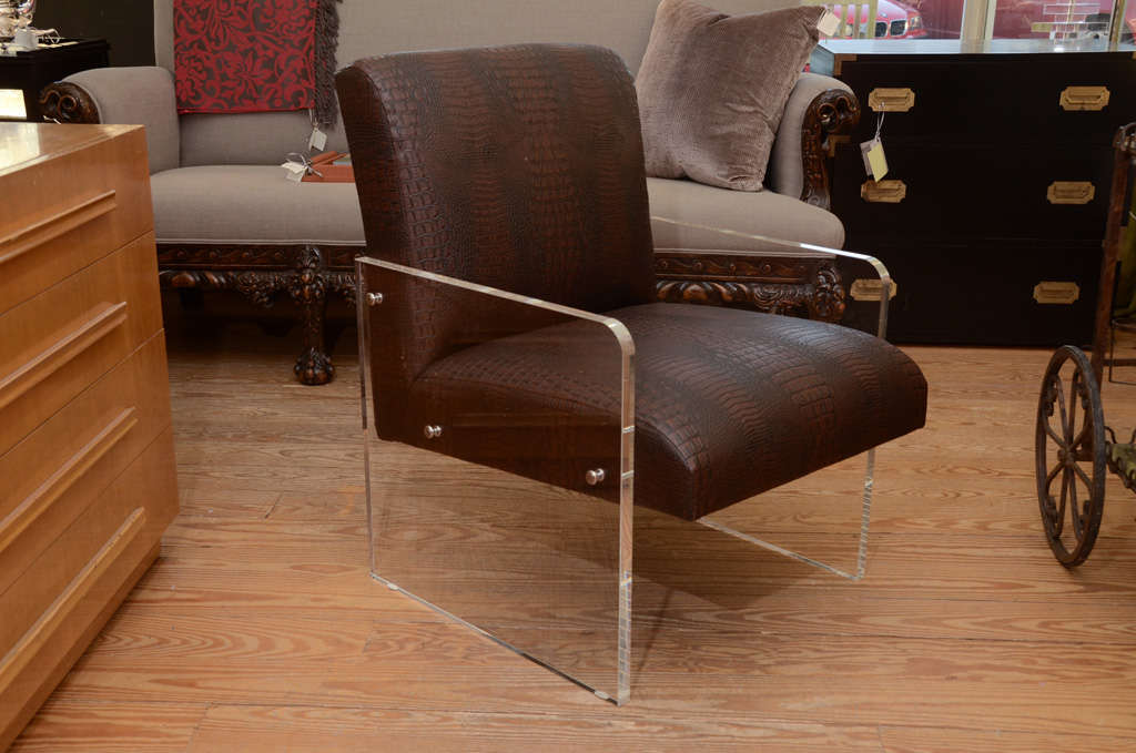 Stunning Lucite armchair in faux deep chocolate snakeskin.
            