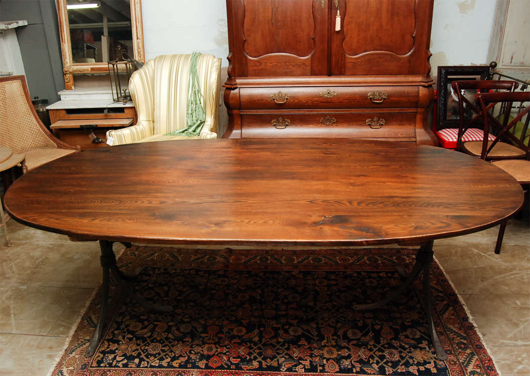 oval dining table metal base