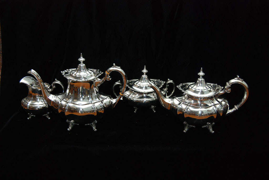 A four piece sterling set made by Reed & Barton in the Hampton Court pattern #660