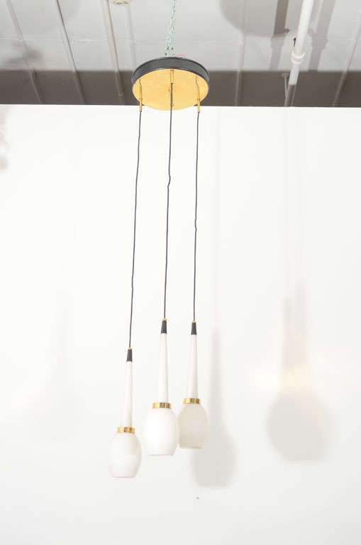Three Pendant Stilnovo Chandeliers with White Glass Globes