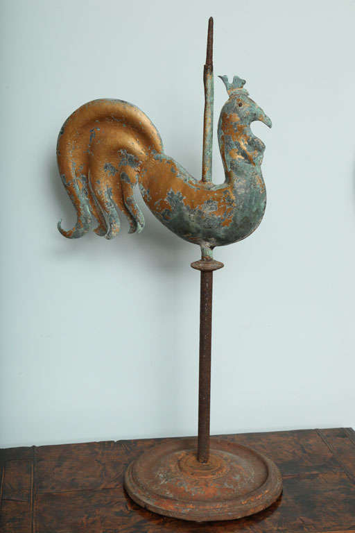 Fine French full bodied gilt copper rooster weathervane, with expressive face, fully formed tail and fantastic verdigris surface, on contemporary cast iron base