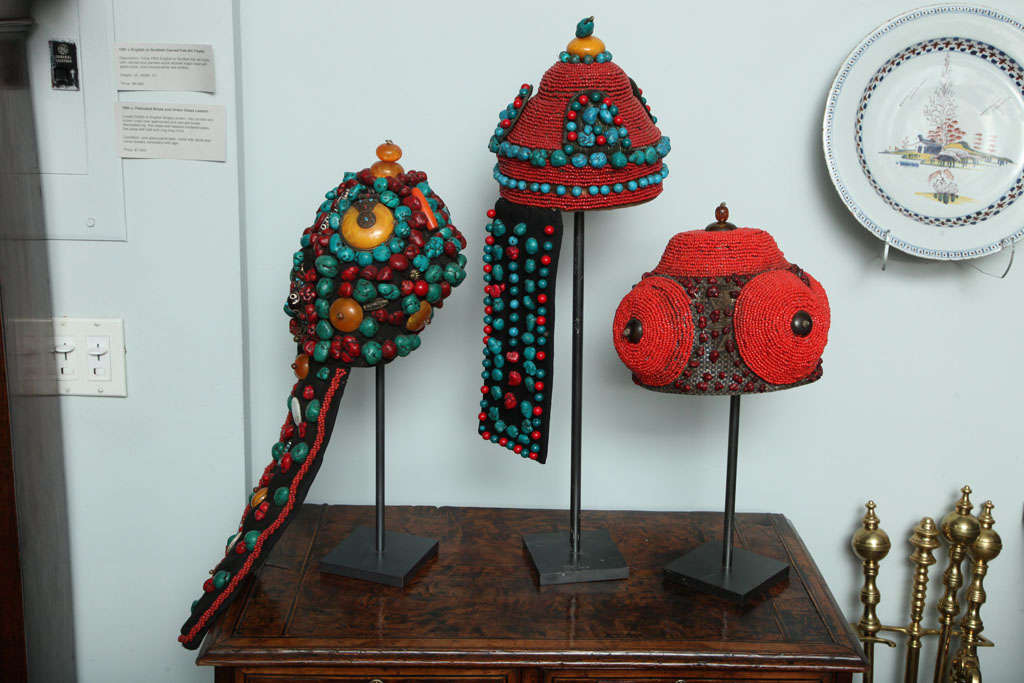Three stunning ceremonial headdresses from the Khampa people of Tibet, comprising mountain coral, turquoise, amber and silver.  These headdresses were seldom used, traditionally just twice yearly and for wedding festivals, and were the most
