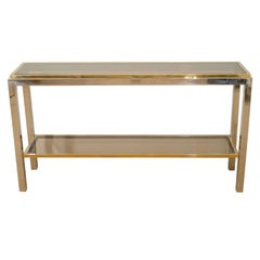 A Willy Rizzo Two Tiered Metal and Smoked Glass Console.