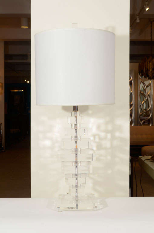 Exceptional pair of Karl Springer influenced stacked lucite lamps.