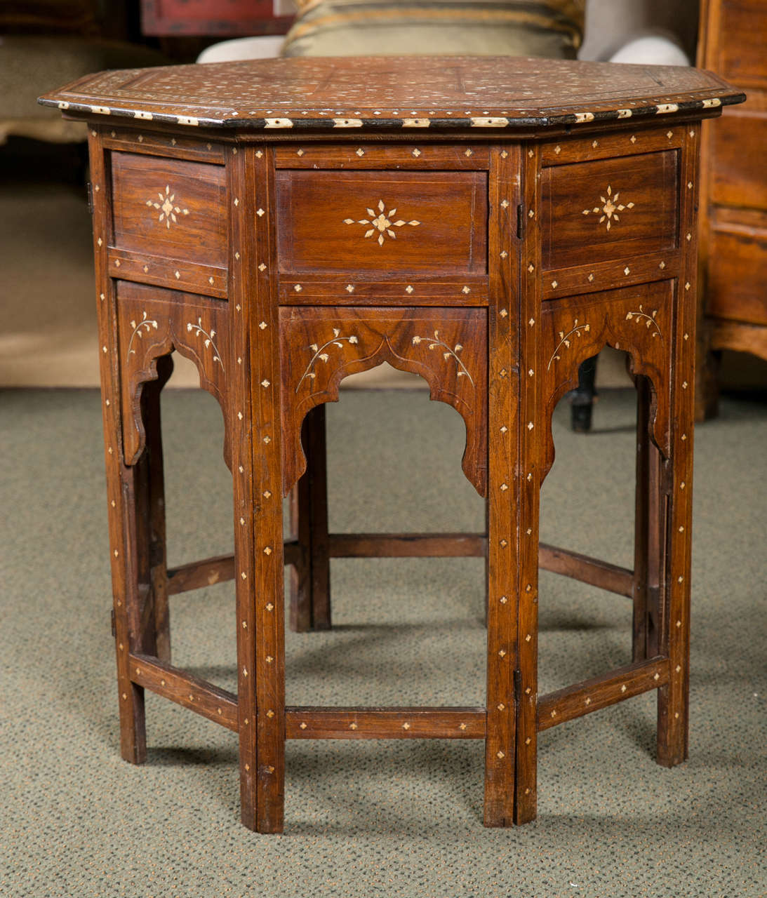 An octagonal Indian side table of hardwood with bone and ebony inlay.