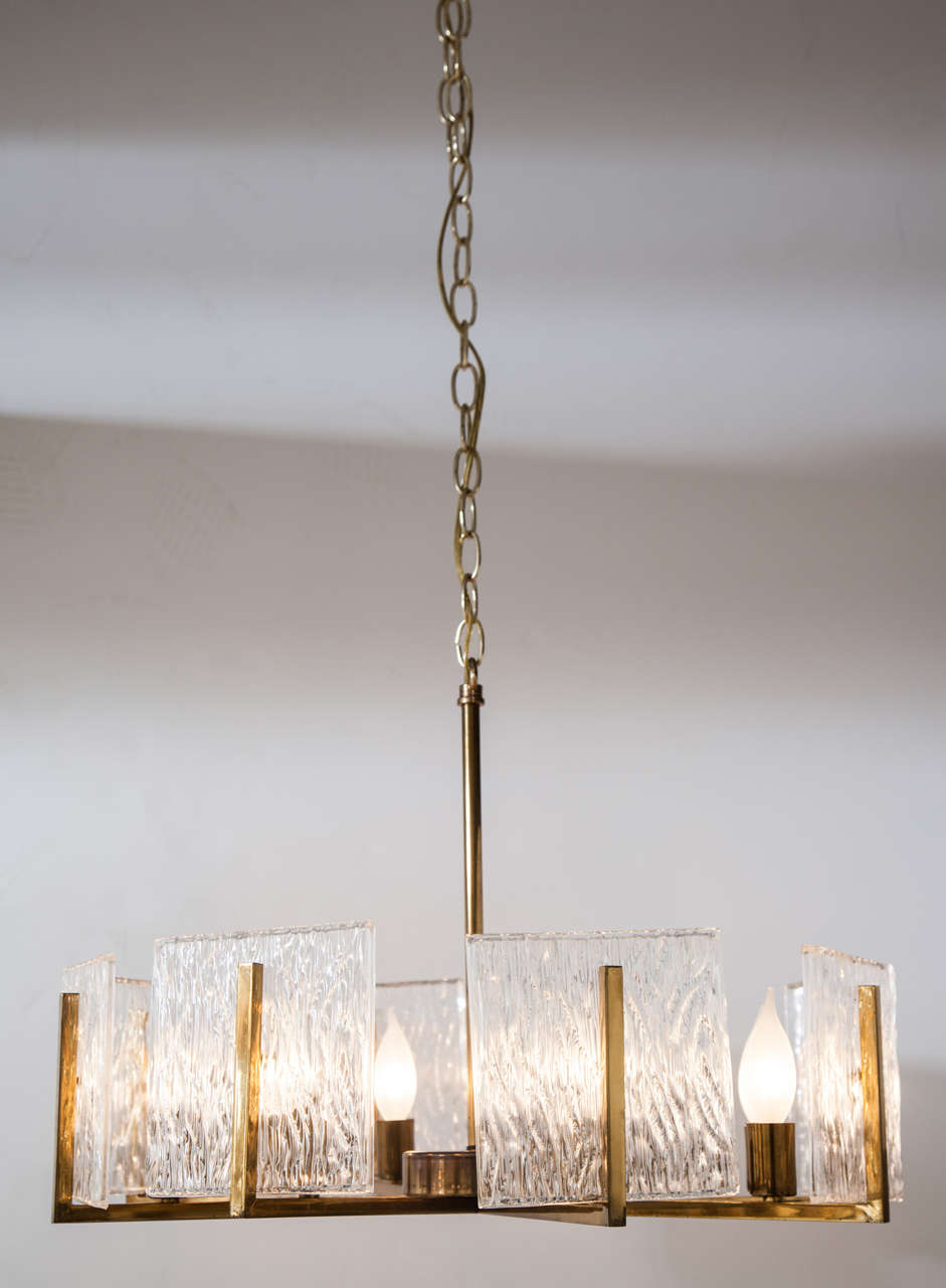 Square frosted glasses 
8 lights
Brass structure