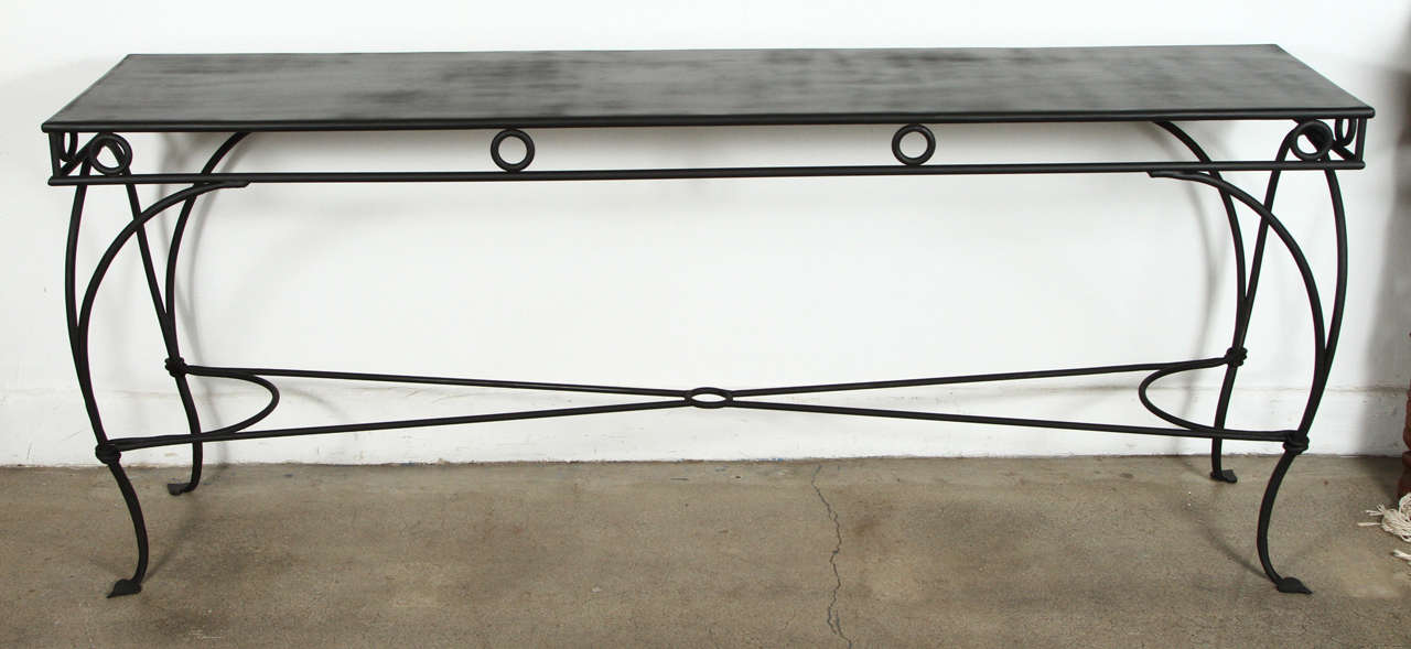 Large Moroccan style wrought iron console or sofa table with very nice foliate details on feet.
Black color, great to use indoor or outdoor.