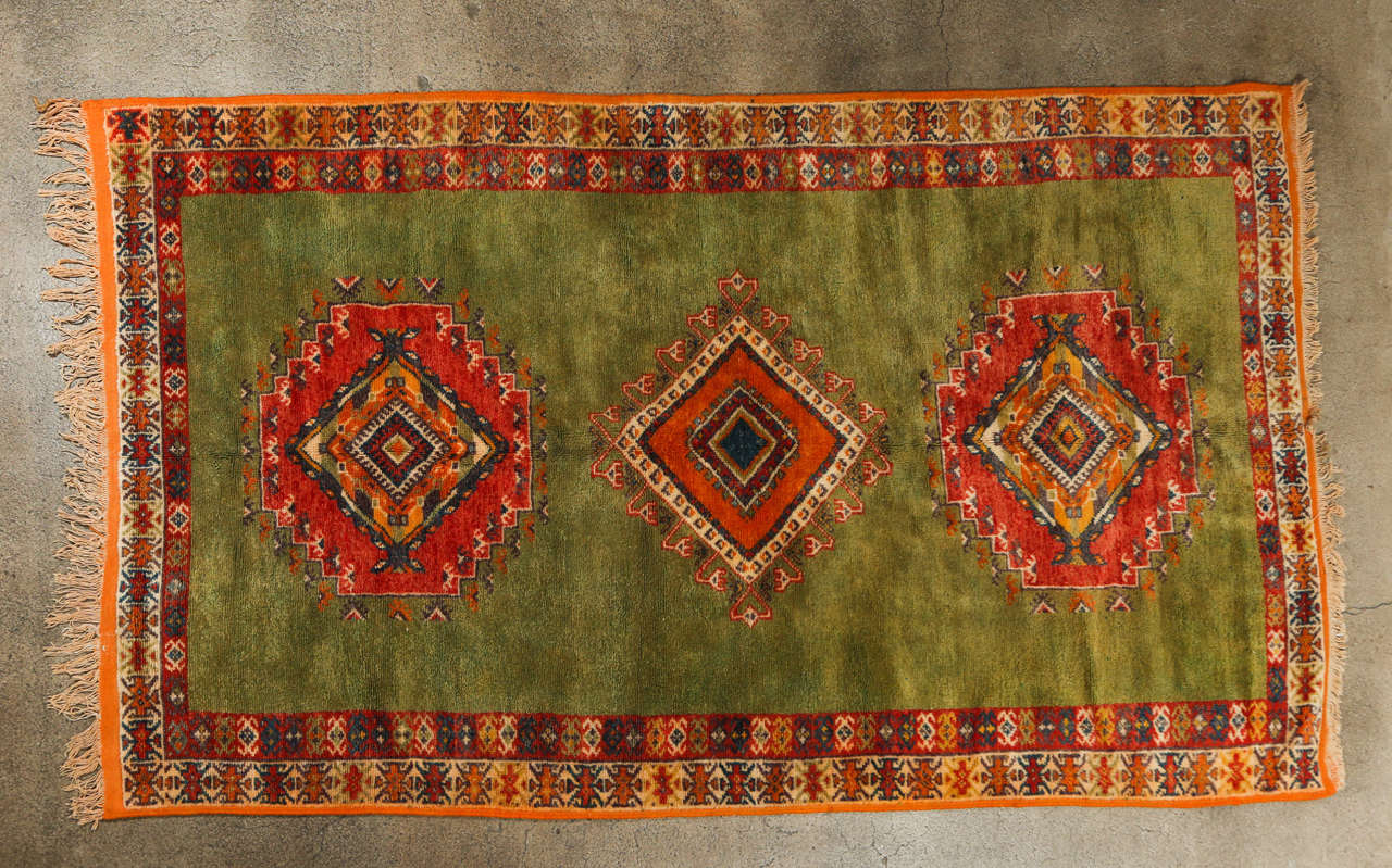 Vintage authentic Moroccan rug handwoven by Berber women in Morocco using organic wo.
This Moroccan rug symbize spring with the green field and geometrical designs.
Great happy authentic Moroccan rug will bring some life and good spirit in any