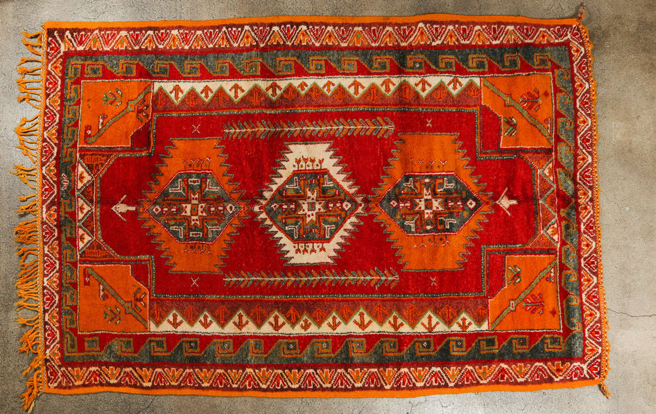 Handwoven by Berber women in Morocco using organic wool and dyes.
Great bold design, warm colors will be a great accent in any room.