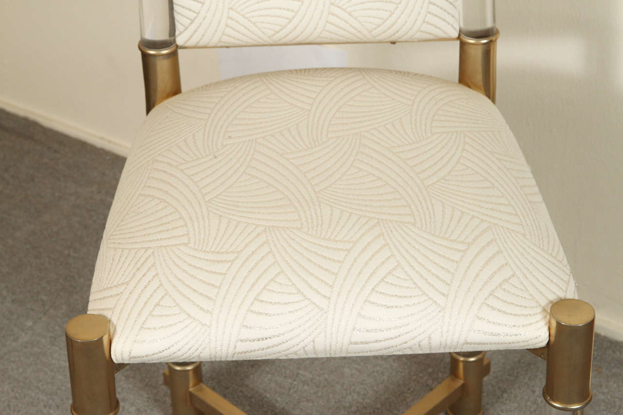 Set of Eight Lucite Dining Chairs with Lucite and Brass Legs and Trim