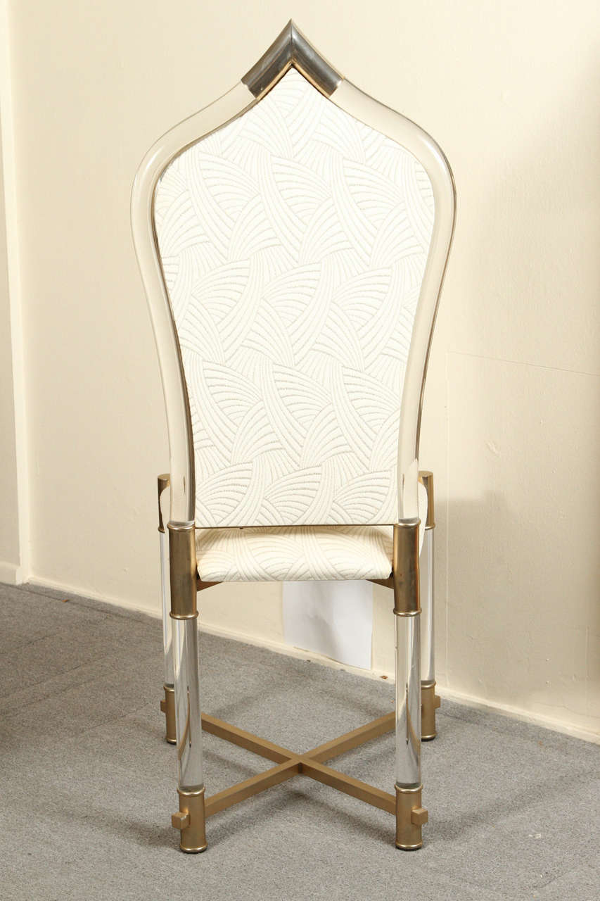 Set of Eight Lucite Dining Chairs with Lucite and Brass Legs and Trim