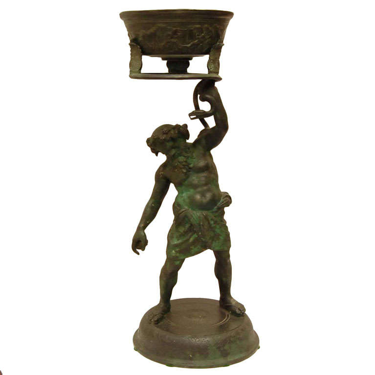 A Bronze figure of "The Drunken Silenus" A Greek God