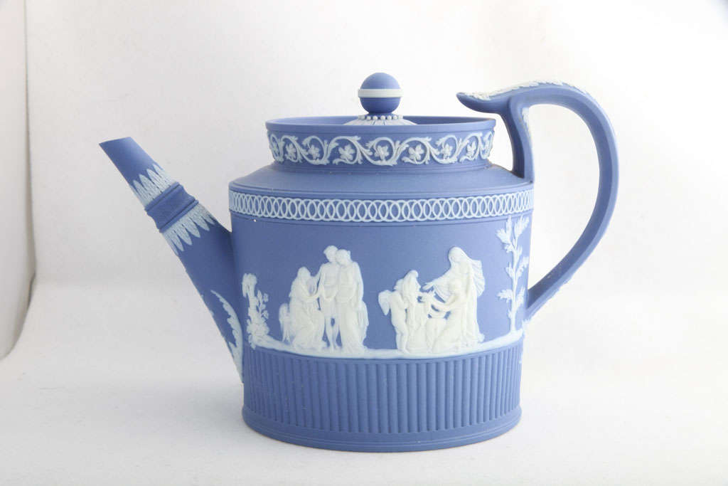 A rare unmarked Adams blue and white jasper teapot decorated with classical figures