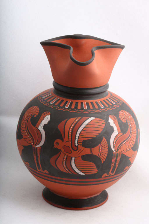 A fine Wedgwood rosso antico and basalt Cambridge ale jug decorated with an Egyptian design