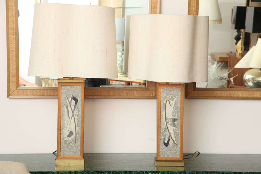 Bruton Sisters (Margaret 1894-1983; Esther 1896-1992; Helen 1898-1985)<br />
Near pair of table lamps with terrazzo decoration set into wood frame. Two-light cluster with three-way switch. <br />
Vintage biomorphic shades in tussah silk.<br