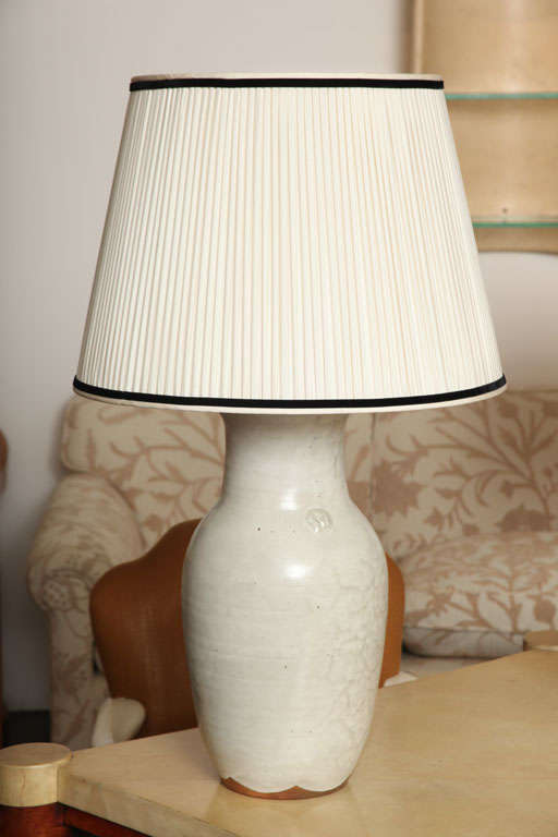 Ben Owen Sr. (1904-1983)<br />
Table lamp in grey-glazed earthenware from Old Plank Road Pottery <br />
Fittings in brushed nickel with two-light cluster, newly rewired.<br />
Signed.<br />
American, c. 1965