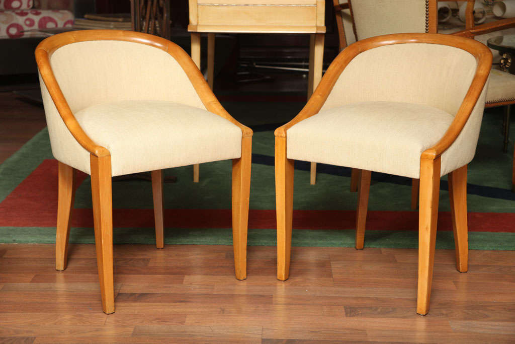 Dominique.

André Domin (1885-1967) & Marcel Genevriere (1885-1967).

Pair of low-back chairs "Gondole", in light maple wood covered with mottled beige linen, from circa 1930.