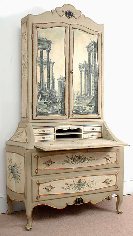Light grey painted secretary with with gold trim & off-white  panels.  Hand-painted armorial neo-classical motifs on drawers, sides, and interiors; the exteriors of the 2 doors on top section have scenes of the ruins of the Roman Forum.  Fall front