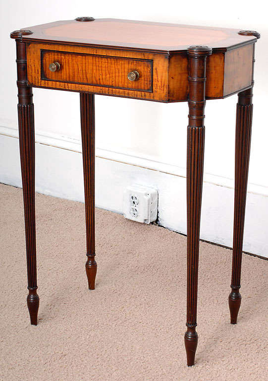 Mahogany and tiger maple with pine and poplar secondary woods. This is a handsome handmade one-drawer Sheraton design New England style stand from around the time of the U.S. centennial celebration. The proportions are perfect and the tiger maple is