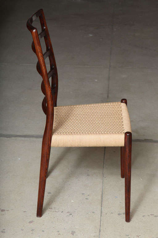 Neils Moller NO. 82 Highback Dining Chairs in Rosewood, set of 10 In Excellent Condition In New York, NY