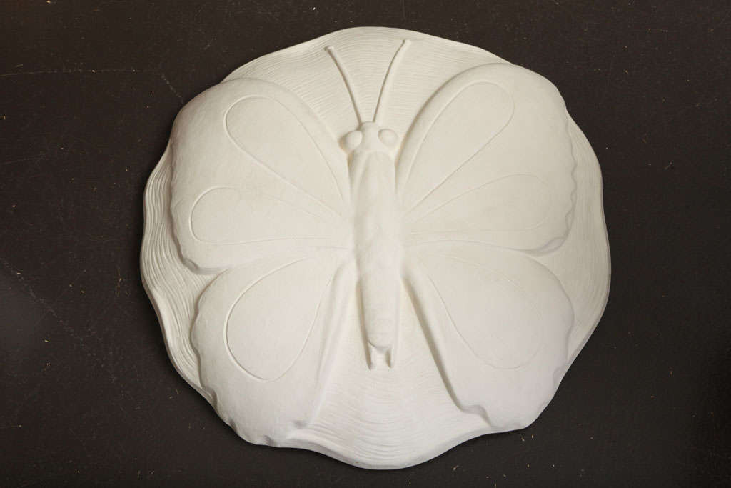 FRANCES ELKINS (1888-1953)<br />
Plaster plafonnier in the shape of a butterfly suspended from 3 chains. American, c. 1940<br />
<br />
PROVENANCE: From the Estate of Katherine Elkins Boyd, Hillsborough, CA