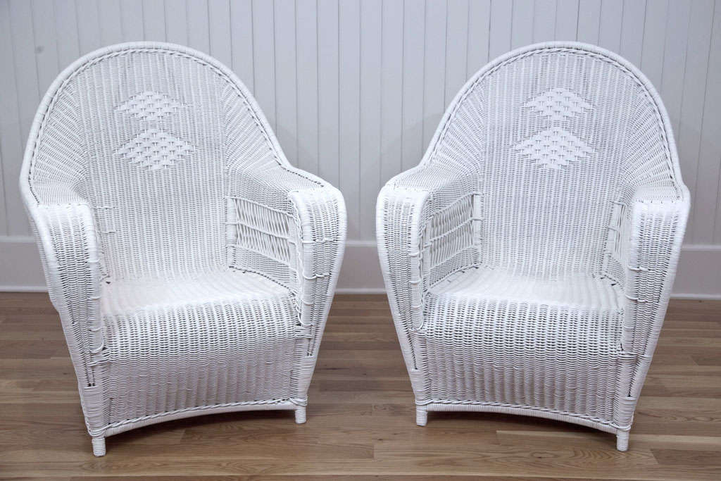 A perfectly matched pair of deco lounge chairs with diamond pattern in back. Large-scale and extremely comfortable.

Dimension: 30